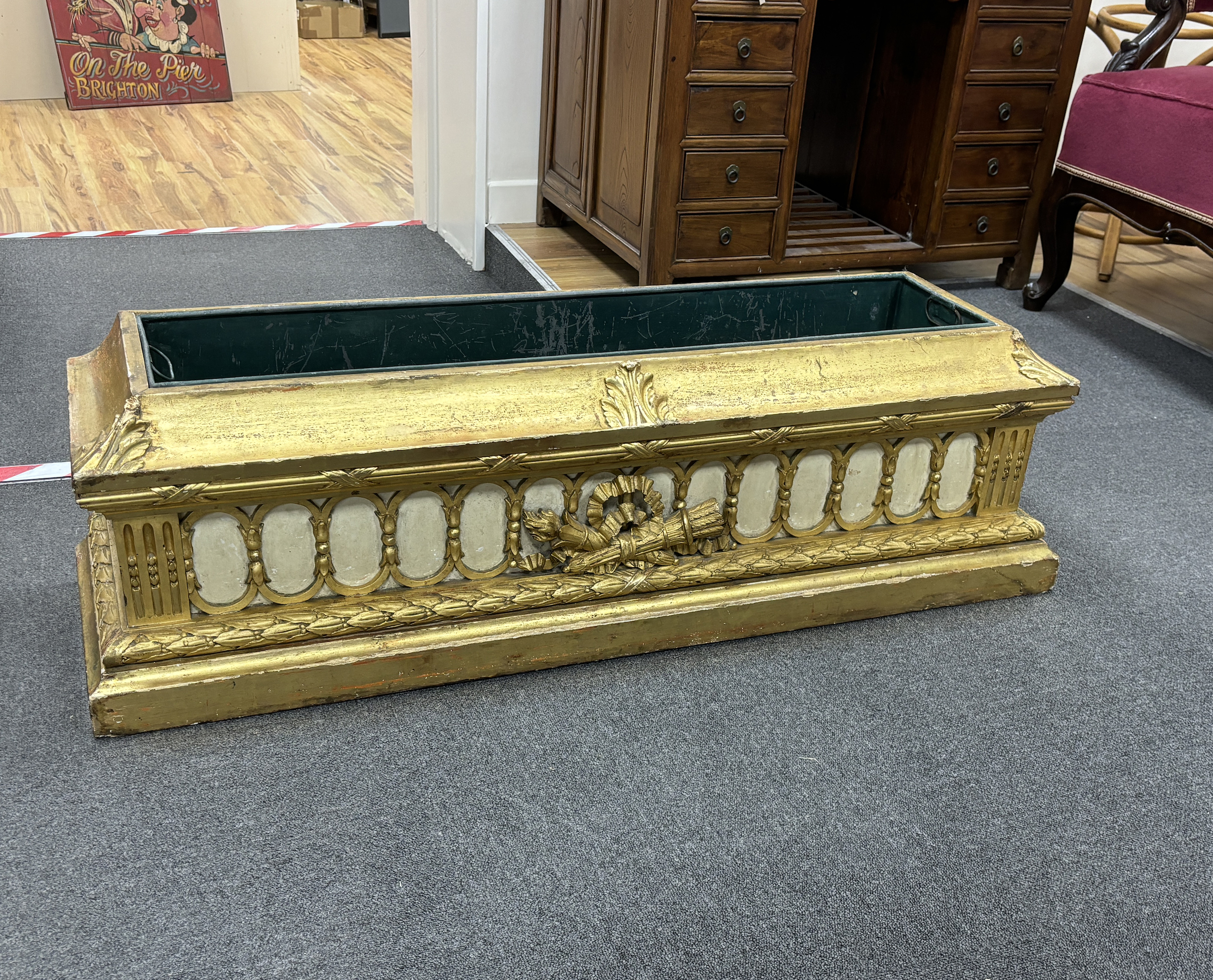 A mid 19th century giltwood and gesso jardiniere, with liner, width 120cm, depth 34cm, height 34cm